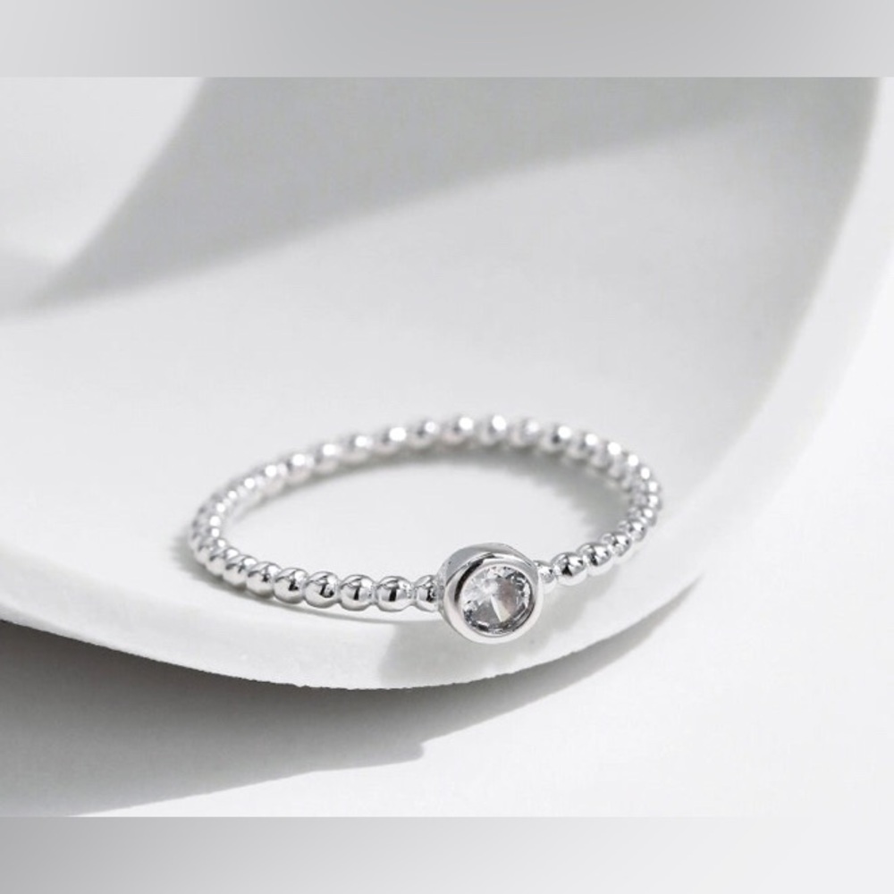 0.1 ct Round Brilliant Rhodium Plated 925 Sterling Silver Moissanite Round Rings